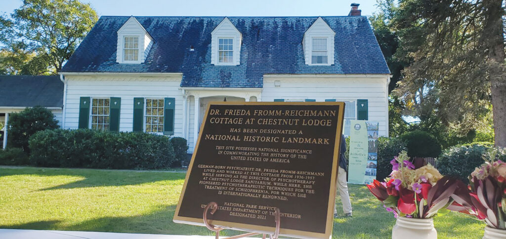 photo of plaque and cottage