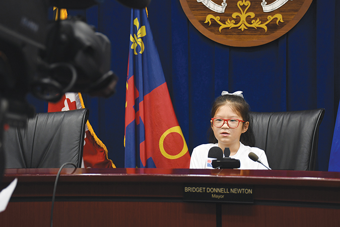 Joyce Tian, pictured in the Mayor and Council chambers, winner of the “If I Were Mayor...” essay contest