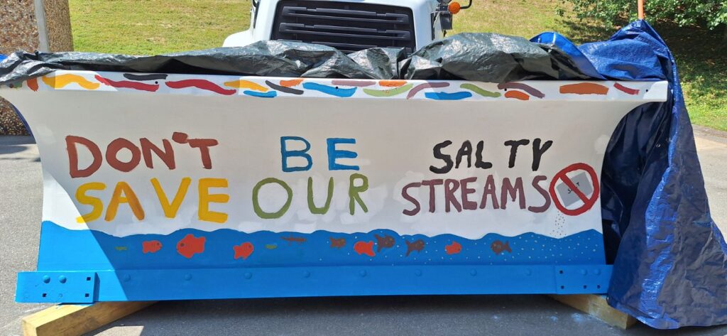 Painted plow reading "Don't be salty, save our streams"